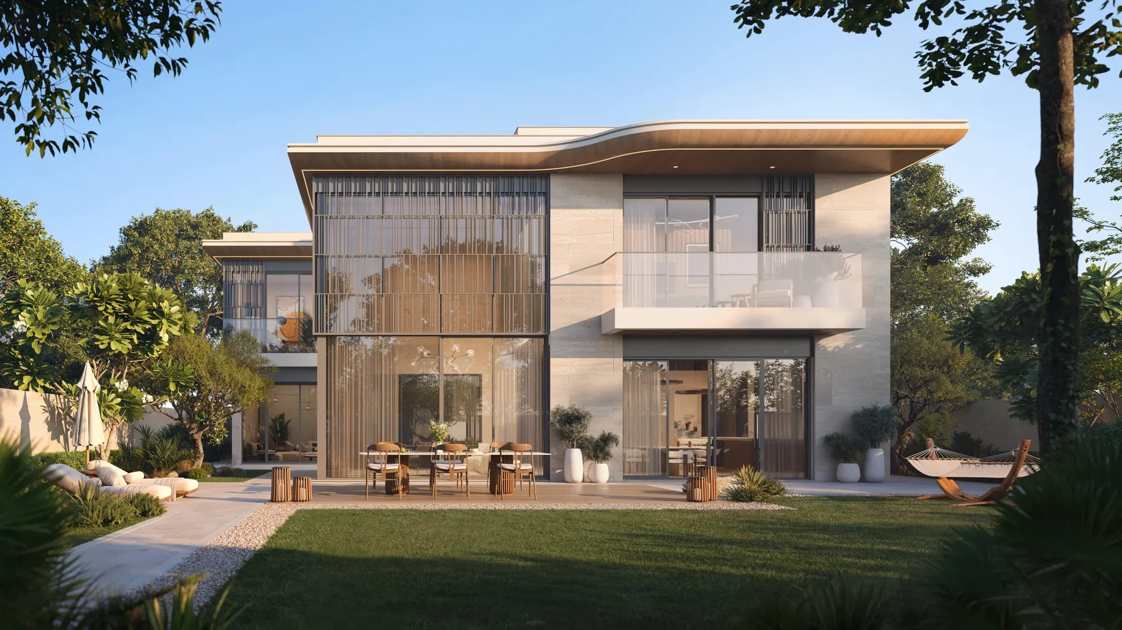 Developer rendering of a Talay standalone villa at dusk with timber louvres, private garden and terrace